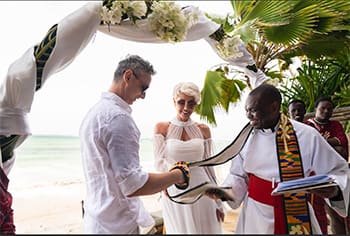religious wedding ceremony in Zanzibar on the beach with local officiant