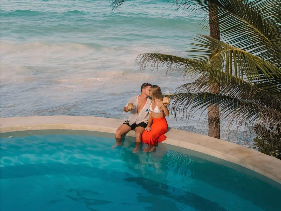 Romantic Kiss at Pool Edge – Asili House Zanzibar