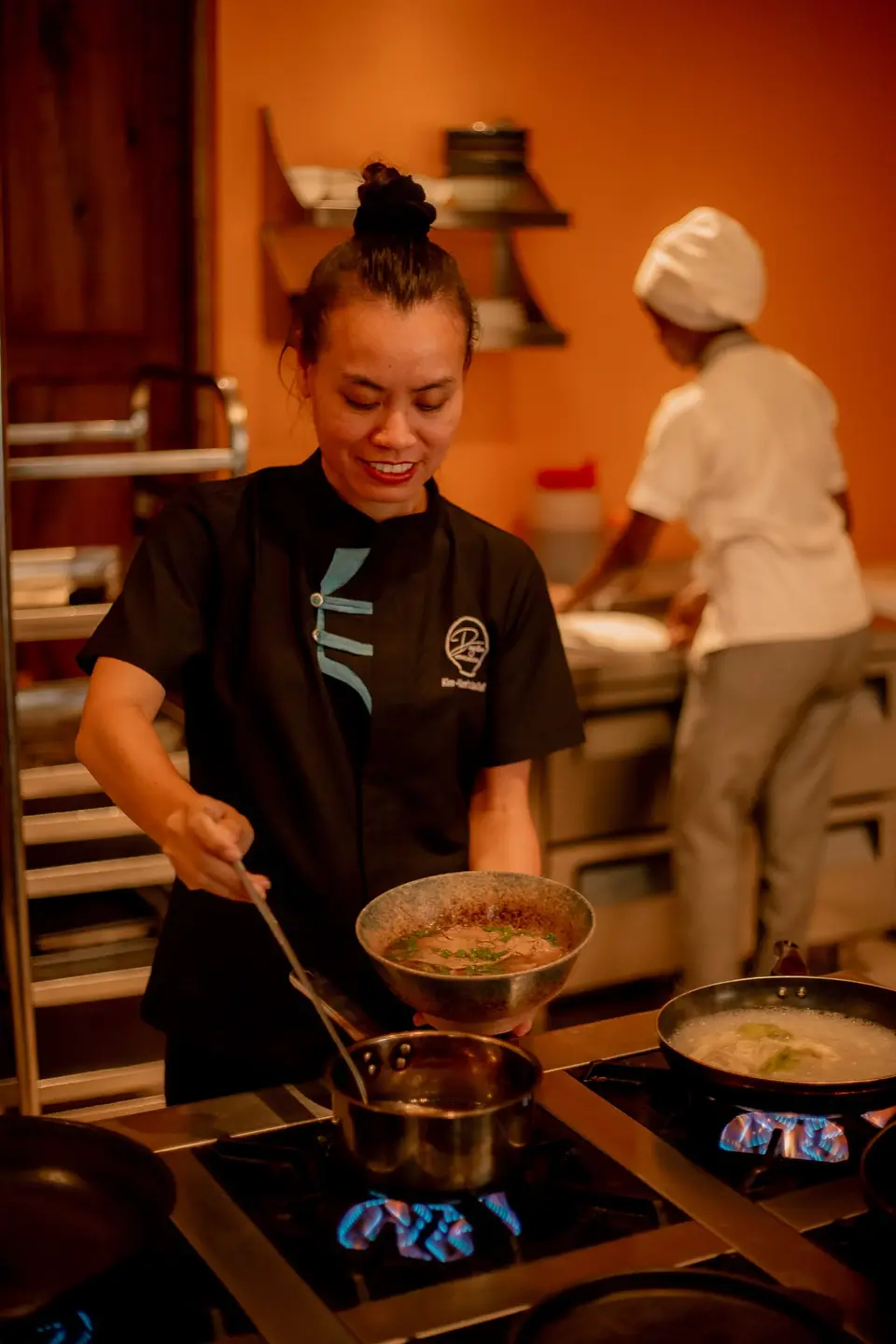 Kim teaching staff how to cook authentic Vietnamese dishes for the Duyen by Kim menu at Boutique Hotel Matlai Zanzibar.
